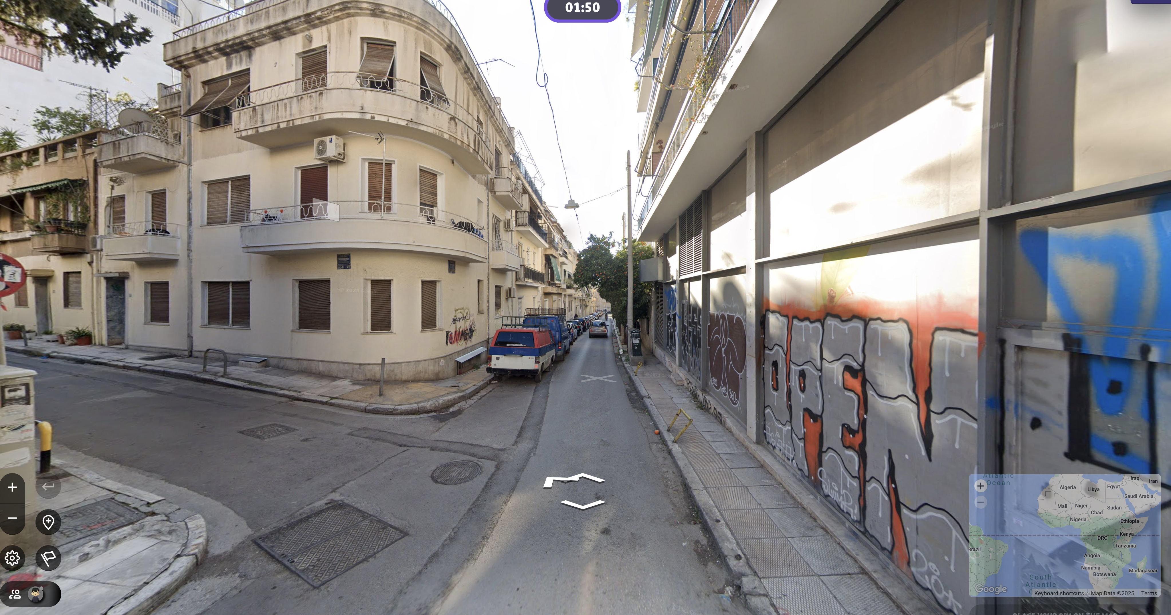 Google streetview of a street corner with grafitti 